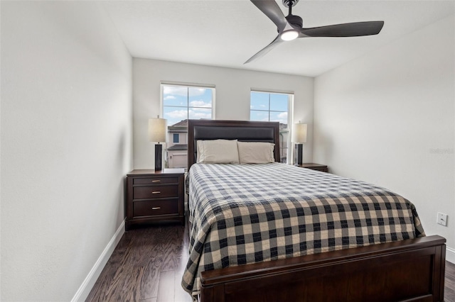 bedroom featuring ceiling fan and dark wood-type flooring