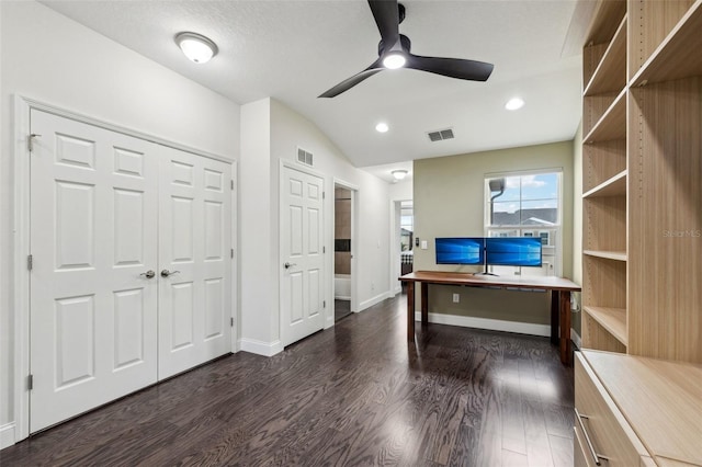 home office featuring ceiling fan and dark wood-type flooring