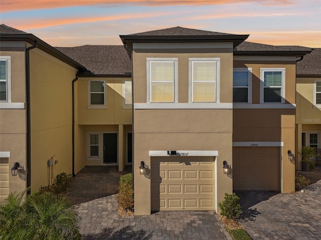 view of front of home with a garage