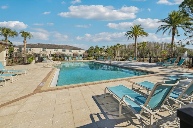 view of swimming pool with a patio area