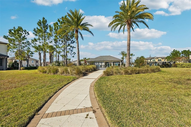 view of community featuring a gazebo and a yard