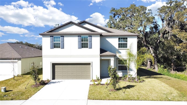 view of front facade featuring a garage and a front lawn