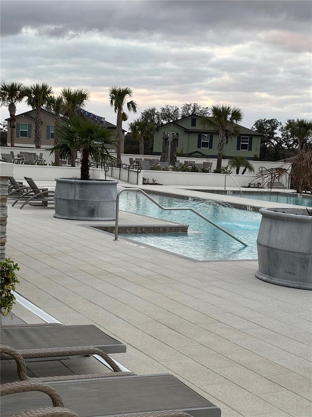 view of pool with a patio area