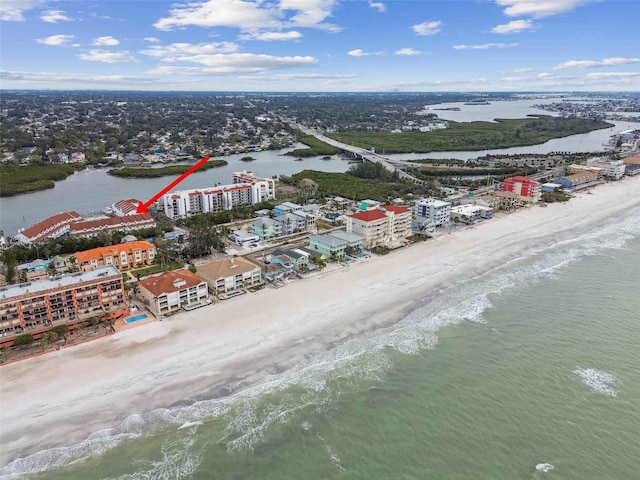 bird's eye view with a beach view and a water view