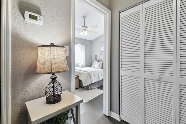 bedroom with dark hardwood / wood-style flooring