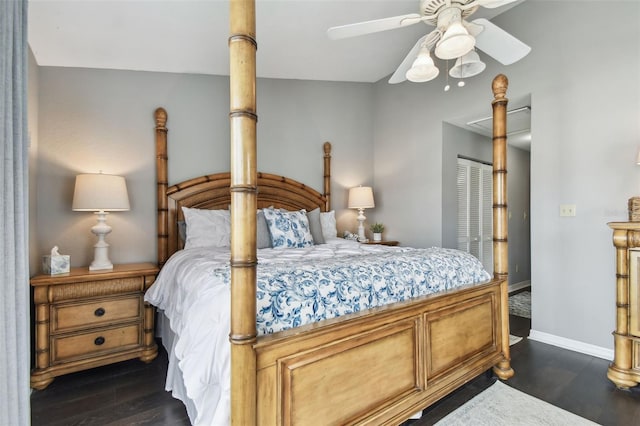 bedroom featuring dark hardwood / wood-style flooring, a closet, and ceiling fan