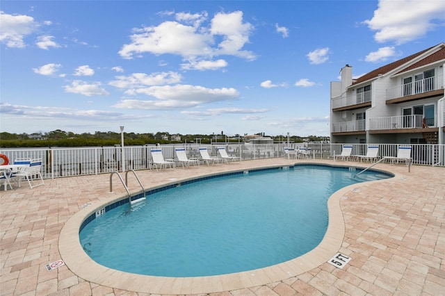 view of pool with a patio area