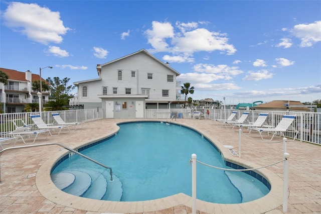 view of swimming pool featuring a patio