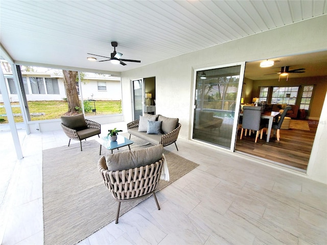 view of patio / terrace featuring ceiling fan and an outdoor living space