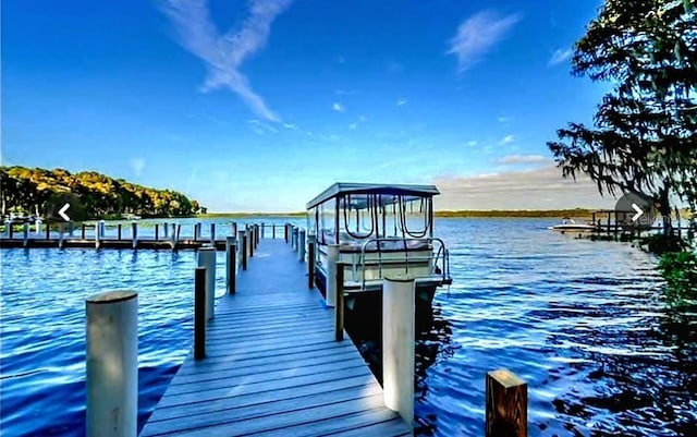 view of dock featuring a water view