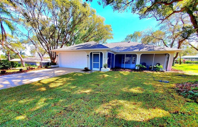 single story home featuring driveway, a front lawn, an attached garage, and stucco siding