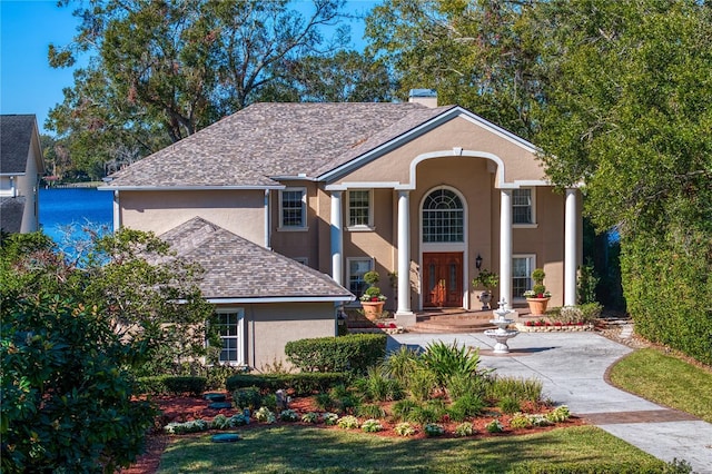 view of front of property with a front yard