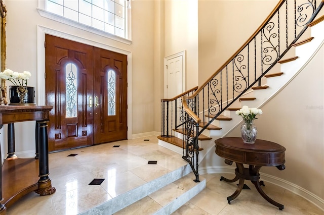 entrance foyer with a high ceiling