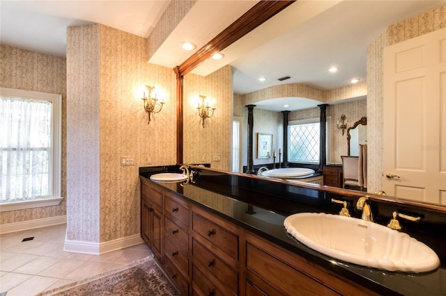 bathroom with tile patterned flooring and vanity