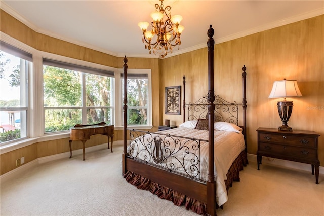 bedroom with carpet, a chandelier, and ornamental molding