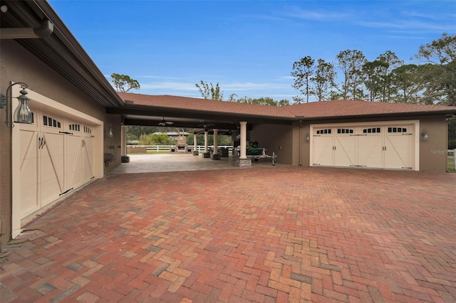 garage with ceiling fan