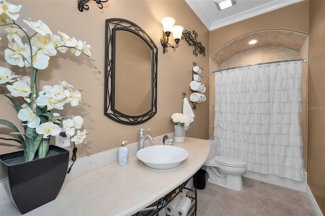 full bathroom featuring shower / tub combo, tile patterned floors, ornamental molding, sink, and toilet