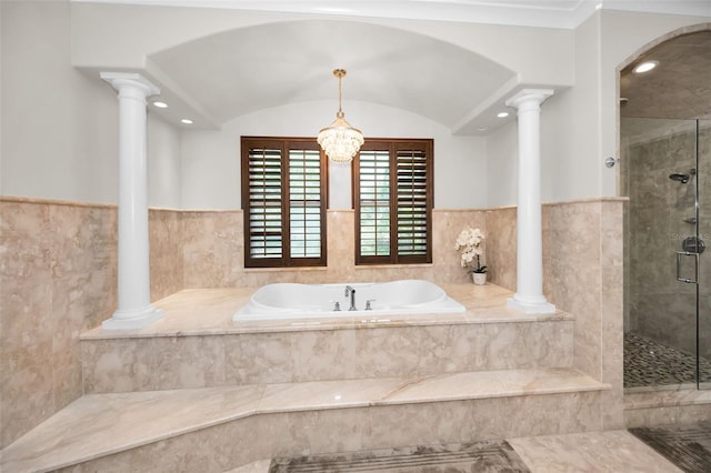 bathroom with a notable chandelier and plus walk in shower