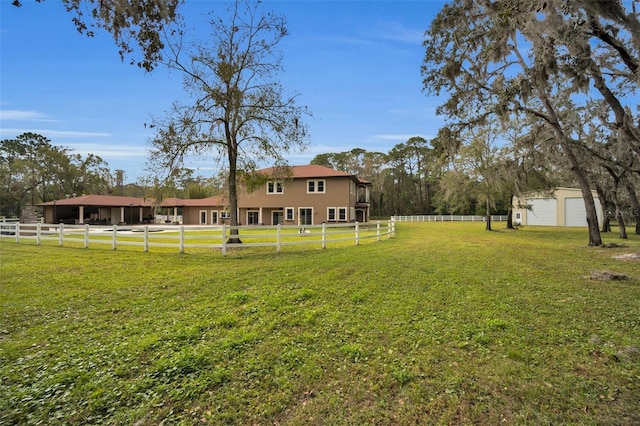 view of yard with a garage