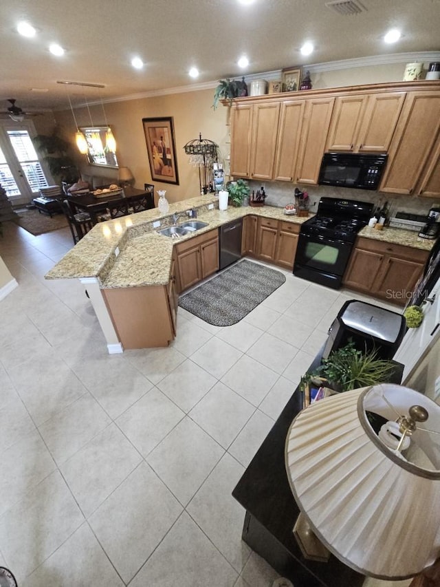 kitchen with sink, kitchen peninsula, crown molding, light tile patterned floors, and black appliances