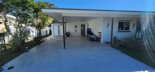 view of patio / terrace featuring a carport