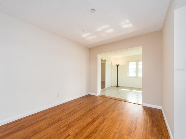 spare room featuring light hardwood / wood-style floors