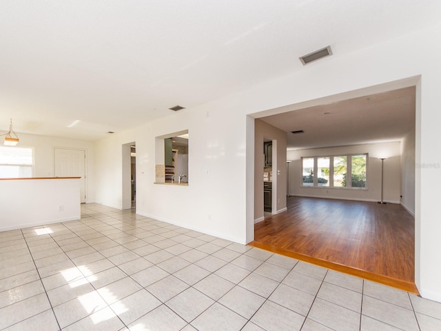 view of tiled spare room