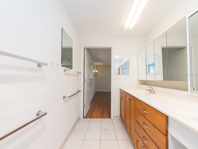 bathroom with tile patterned flooring and vanity