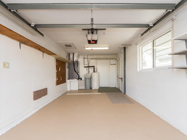 garage with heating unit and a garage door opener