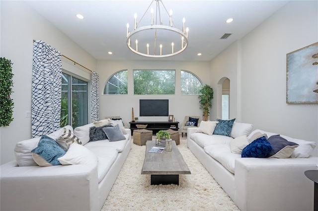 living room with a chandelier