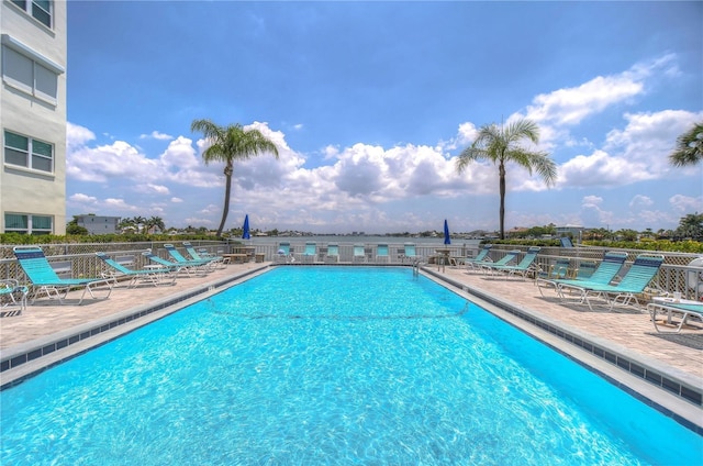 view of swimming pool featuring a patio area