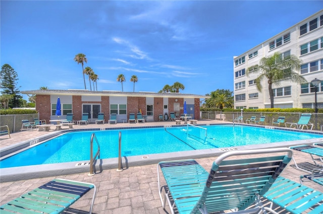 view of pool featuring a patio