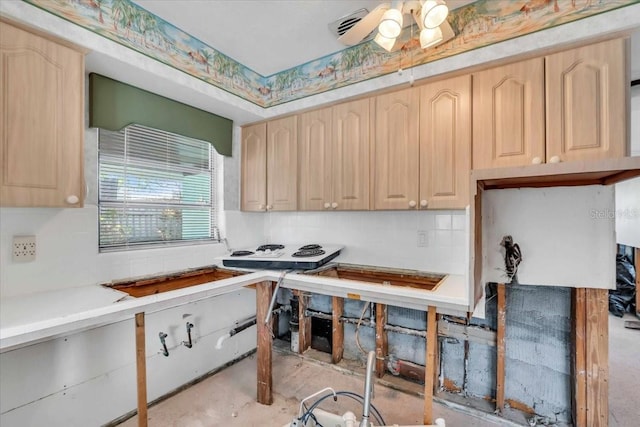 kitchen featuring ceiling fan, light brown cabinets, light countertops, and backsplash