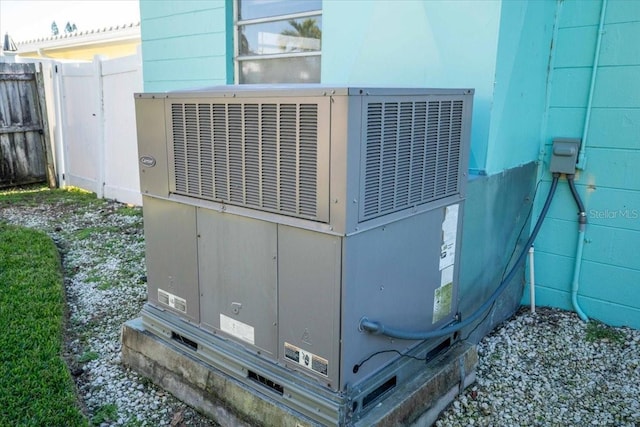 exterior details featuring fence and central air condition unit