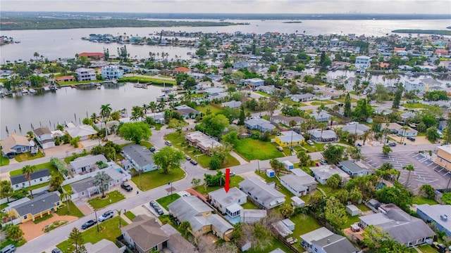 drone / aerial view with a water view