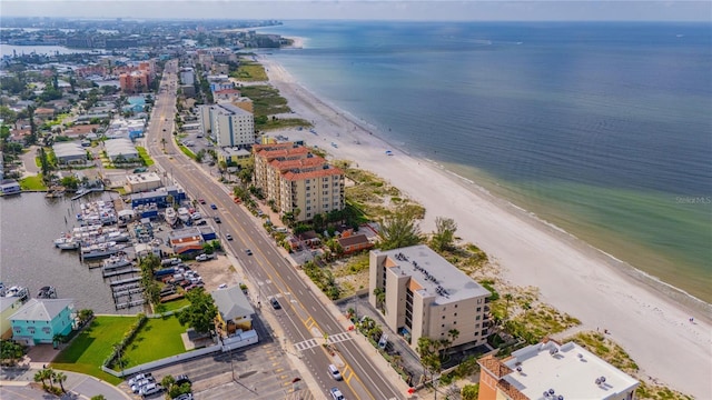 aerial view featuring a water view and a beach view