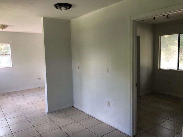 empty room featuring light tile patterned flooring