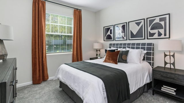 bedroom with light colored carpet