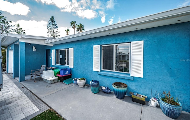 exterior space with a patio area