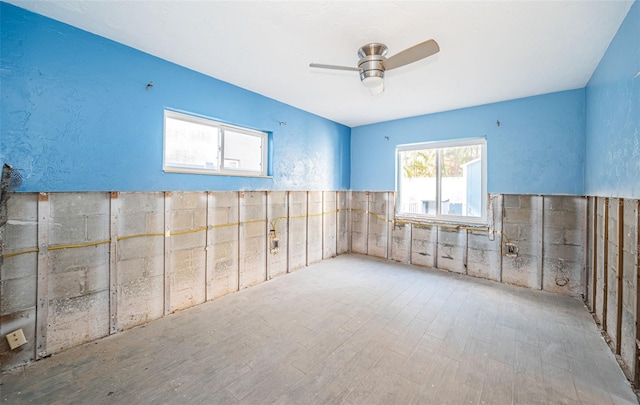 unfurnished room featuring ceiling fan