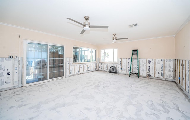 interior space with ceiling fan and ornamental molding