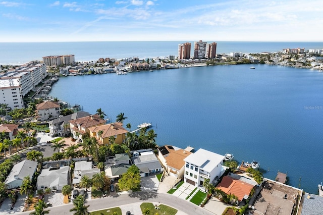 birds eye view of property featuring a water view