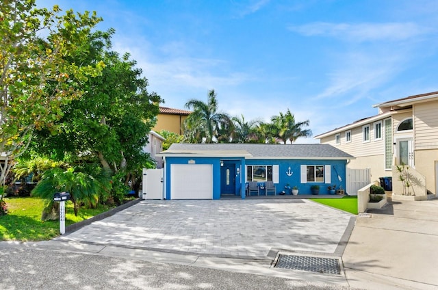 view of front of home featuring a garage