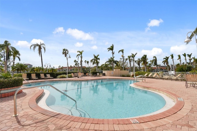 view of swimming pool featuring a patio