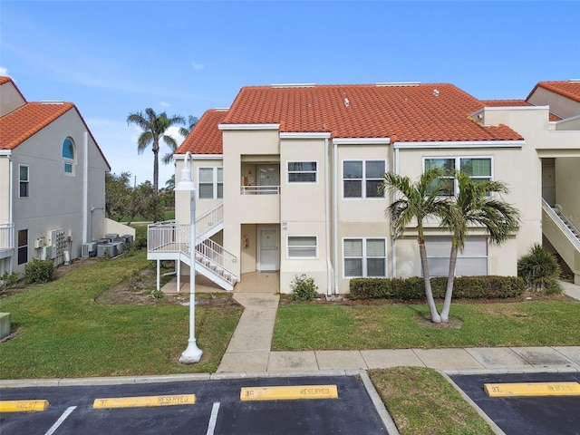 view of building exterior featuring central AC