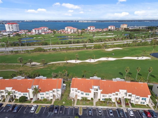 drone / aerial view with a water view