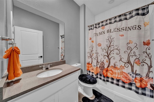 full bathroom featuring vanity, toilet, and shower / bathtub combination with curtain