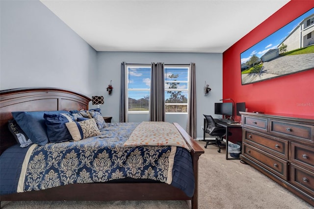 bedroom with light colored carpet