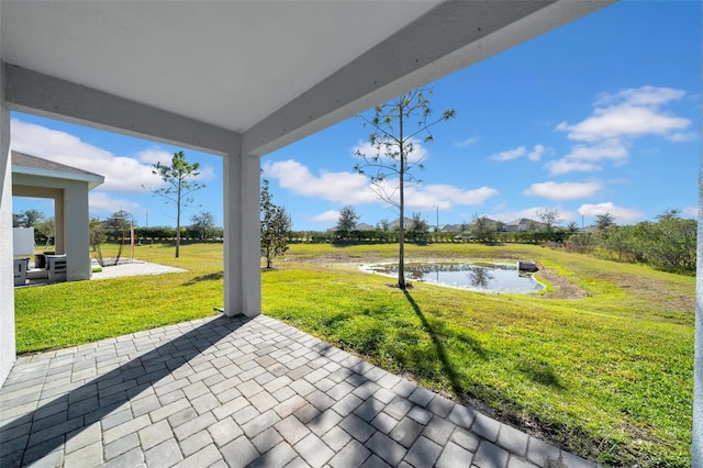 view of patio / terrace featuring a water view