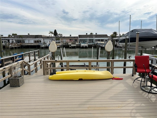 dock area with a water view